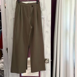 Unusual buttons. Cross-over full straight leg pants